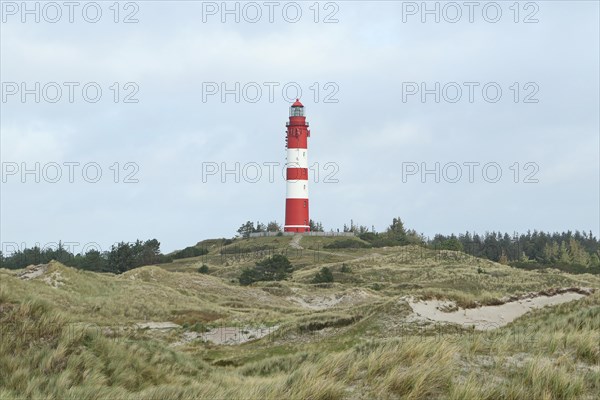 Lighthouse in dune landscape