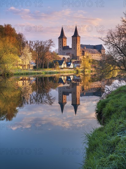 Rochlitz Castle on the river Zwickauer Mulde at Morgenrot