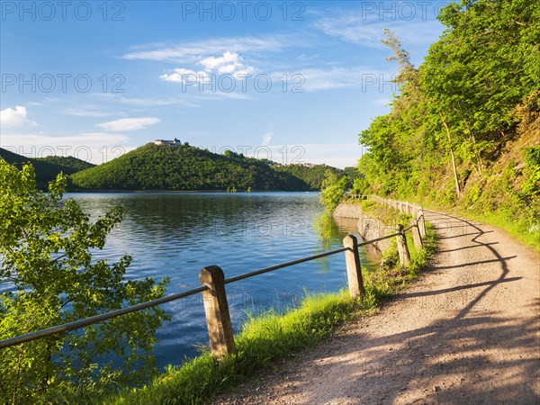 Old road on the shore in the evening light