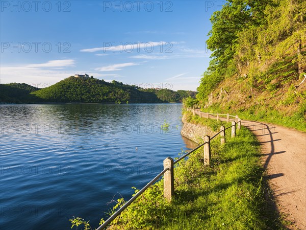 Old road on the shore in the evening light