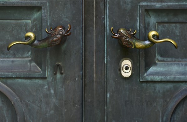 Fish as door handles on the portal are supposed to bring luck when touched