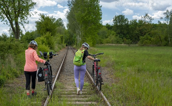 Girlfriends on a bike ride in the north of Berlin