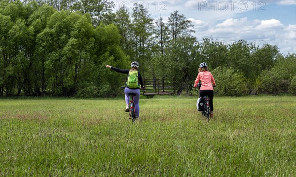 Girlfriends on a bike ride in the north of Berlin