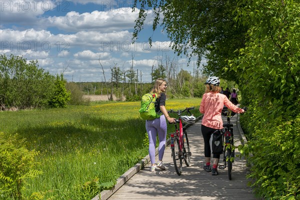 Girlfriends on a bike ride in the north of Berlin