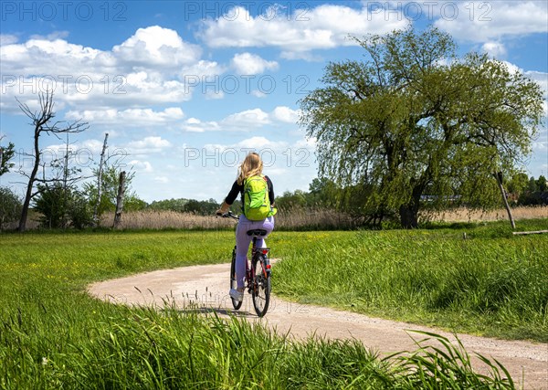 Girlfriends on a bike ride in the north of Berlin