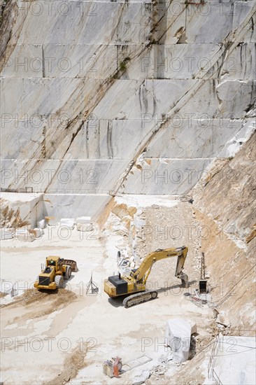 Terraced rock face in open pit Carrara marble mines or quarries
