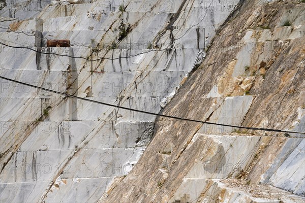 Terraced rock face in open pit Carrara marble mines or quarries