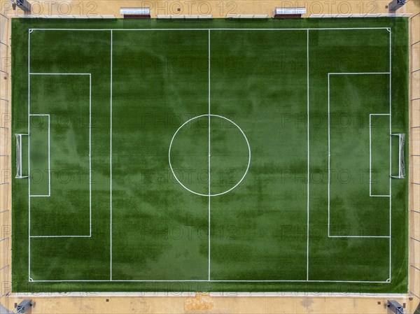 Aerial view of soccer pitch covered with artificial grass in Altea La Vella