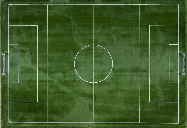 Aerial view of soccer pitch covered with artificial grass in Altea La Vella
