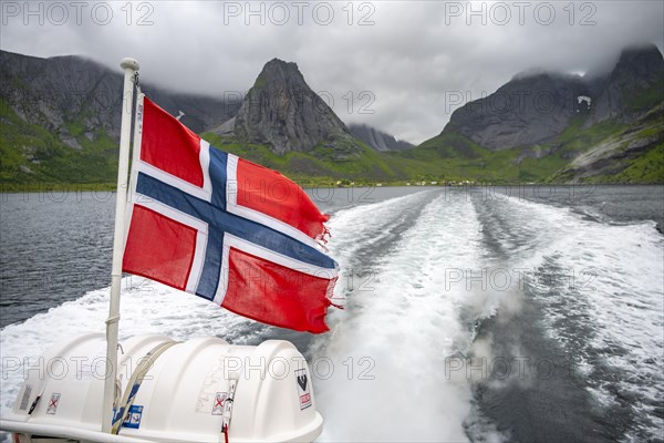 Norwegian flag at the ferry from Reine to Vinstadt on the Reinefjord