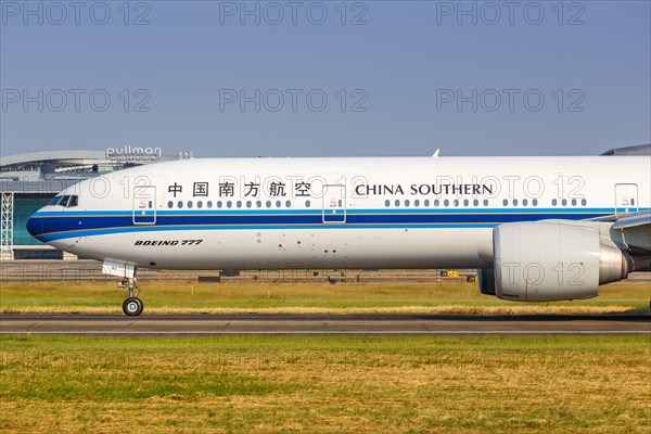 A China Southern Airlines Boeing 777-300ER aircraft with registration number B-7183 at Guangzhou Airport