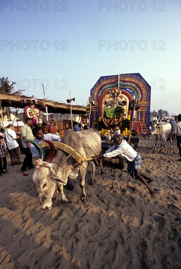 Gods taken procession in open bullock carts