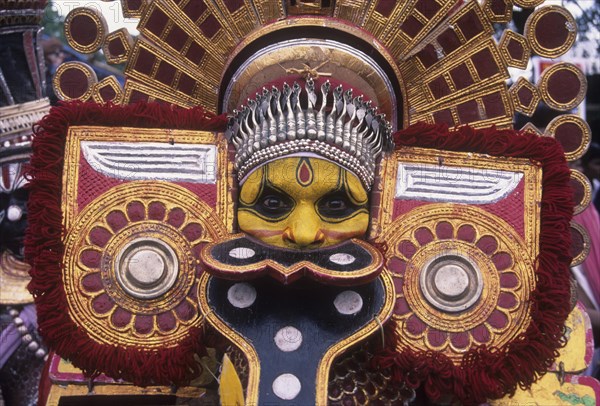 Theyyam dancer