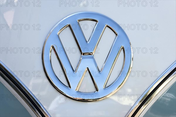 Chrome VW logo on the front of a Volkswagen Type 2 Transporter
