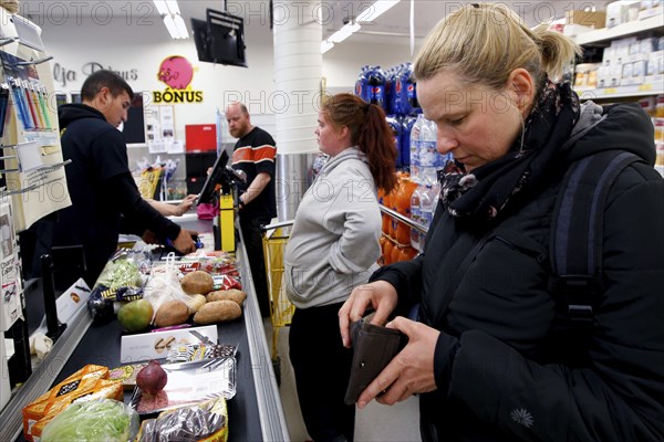 Woman at checkout