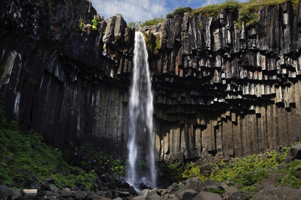 Columnar basalt with waterfall