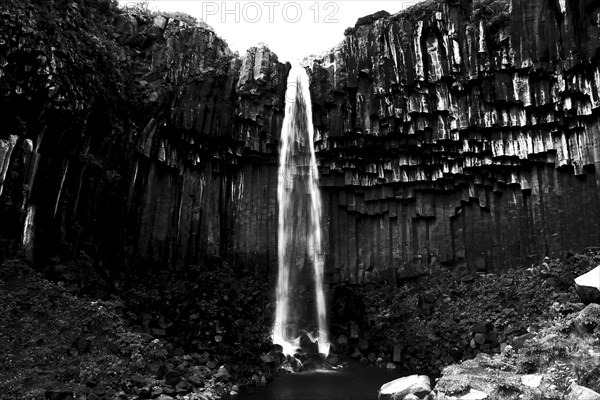 Columnar basalt with waterfall