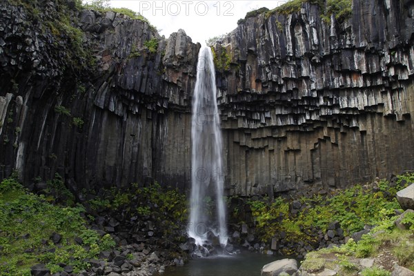 Columnar basalt with waterfall