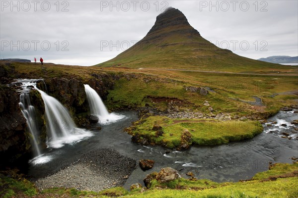 Waterfall in front of mountain