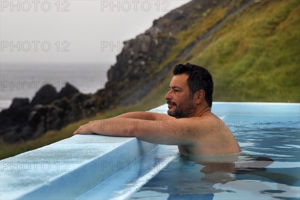 Man in swimming pool