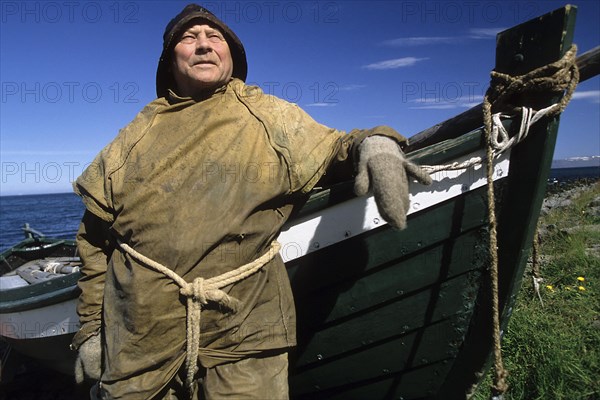 Fisherman with fishing boat