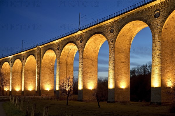 Illuminated viaduct in the evening