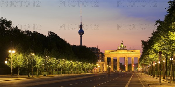 Empty street of June 17 in the morning with Brandenburg Gate and Berlin TV Tower