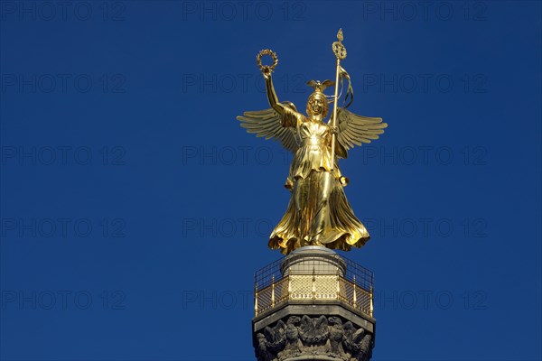 Golden bronze sculpture of Victoria on the Victory Column