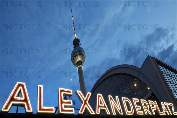 Alexanderplatz S-Bahn station with the Berlin TV tower in the evening