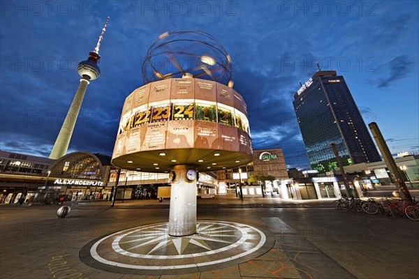 Alexanderplatz with the Berlin TV Tower and the Urania World Clock in the evening