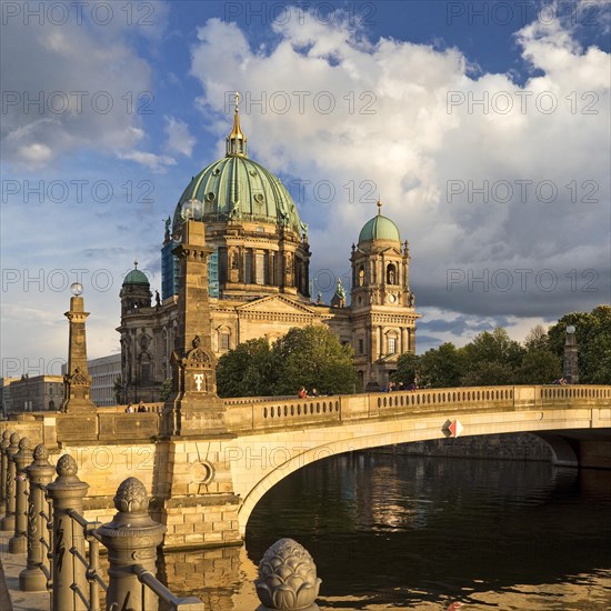 Berlin Cathedral on Museum Island with Friedrichsbruecke over the Spree