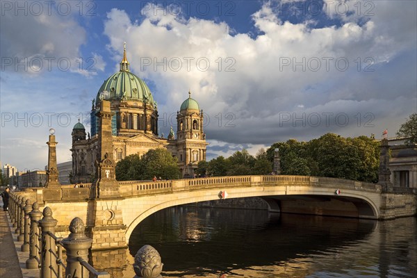 Berlin Cathedral on Museum Island with Friedrichsbruecke over the Spree