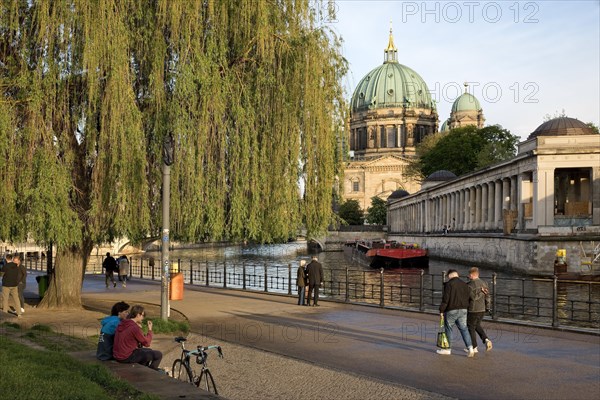 People in James Simon Park with Berlin Cathedral and the Spree River