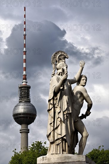 Historical sculpture in front of the Berlin TV Tower