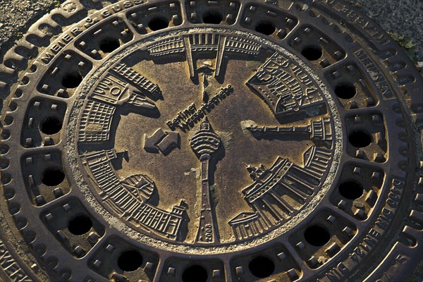 Berlin sights on a manhole cover of the Berliner Wasserbetriebe
