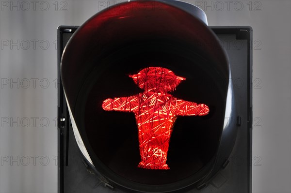 Pedestrian traffic light with red eastern traffic light man Stoppi by Karl Peglau