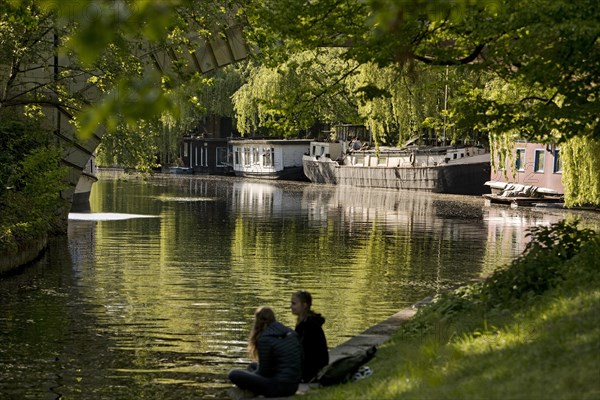 Recreation at the Unterschleuse Landwehrkanal with viaduct