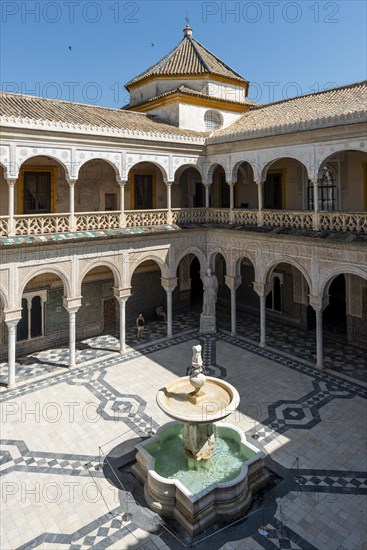 Inner courtyard with archways and fountain