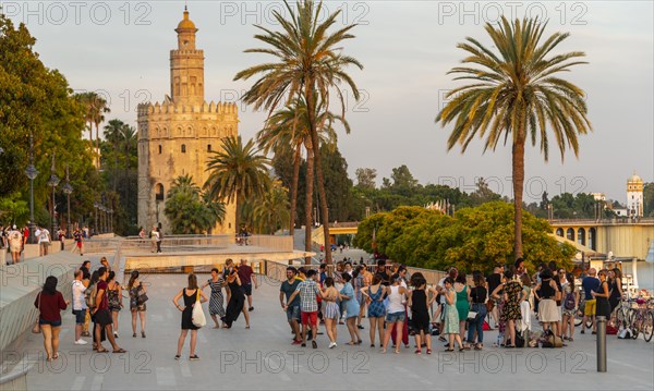 Dancing people at the promenade Muelle de la sal