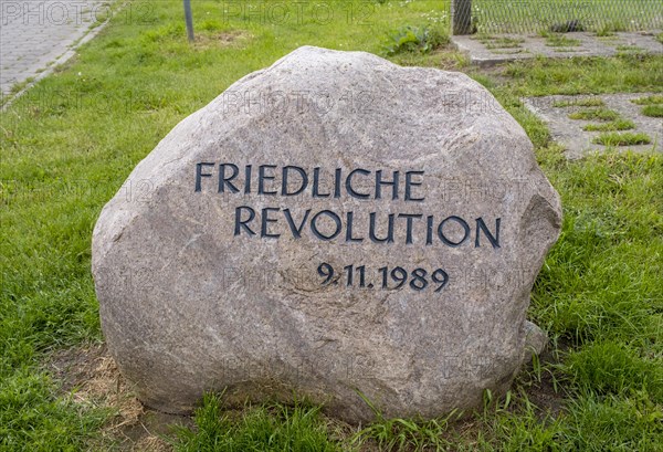 Memorial stone to the Peaceful Revolution on 09.11.1989 at the former inner-German border at the river Elbe in Doemitz