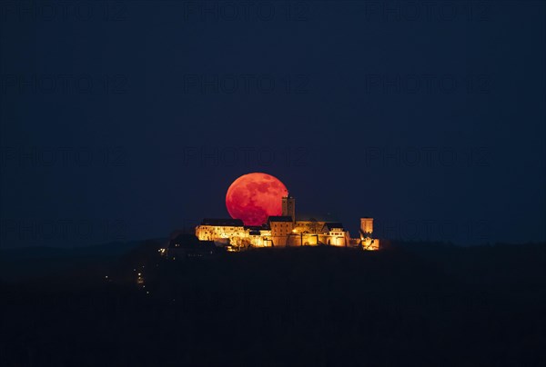 Wartburg castle at night with moonrise