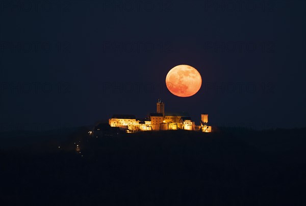 Wartburg castle at night with moonrise