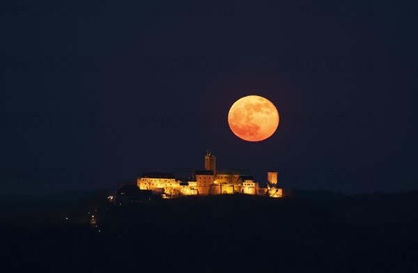 Wartburg castle at night with moonrise