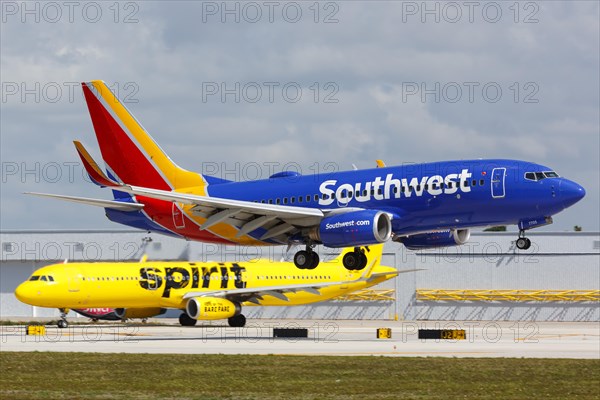 A Southwest Airlines Boeing 737-700 aircraft with registration number N7705A lands at Fort Lauderdale Airport