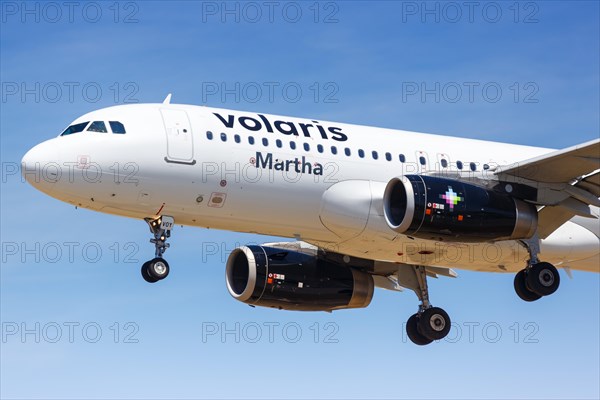 A Volaris Airbus A320 aircraft with registration XA-VOY lands at Los Angeles Airport