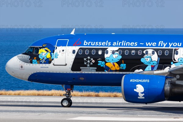 An Airbus A320 aircraft of Brussels Airlines with the registration number OO-SND with the special livery The Smurfs at Heraklion Airport