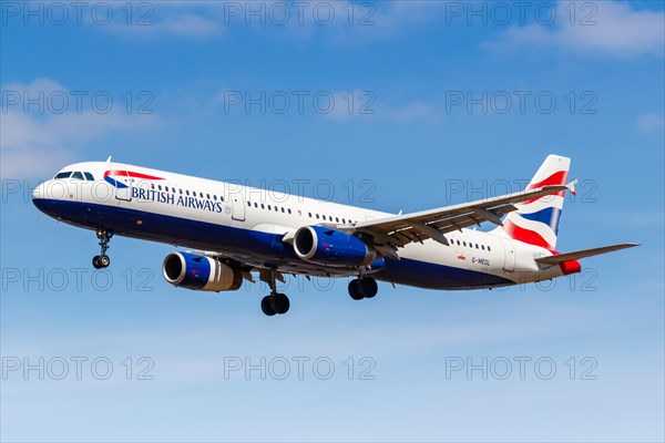 A British Airways Airbus A321 with the registration G-MEDL lands at London Heathrow Airport