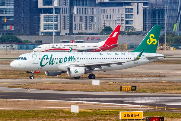 A Spring Airlines Airbus A320 with registration number B-8371 at Shanghai Hongqiao Airport