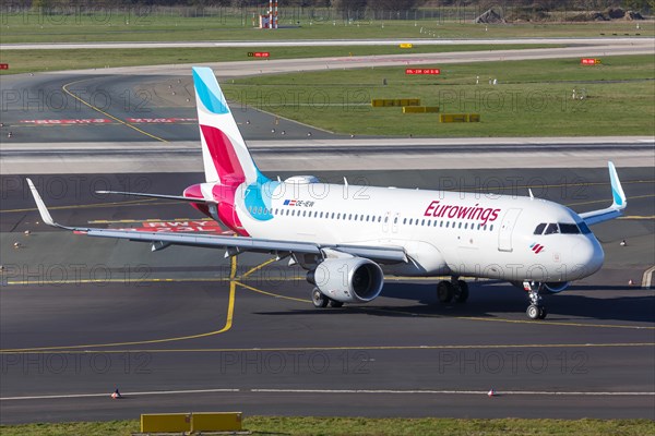An Airbus A320 of Eurowings Europe with the registration OE-IEW at Duesseldorf Airport
