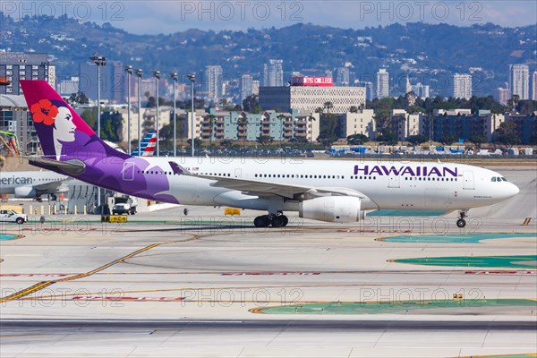 An Airbus A330-200 aircraft of Hawaiian Airlines with registration N395HA at Los Angeles Airport